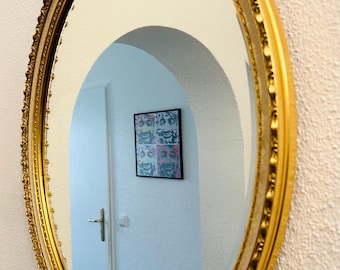 A decorative Belgian old mirror / wall mirror from the 50s.