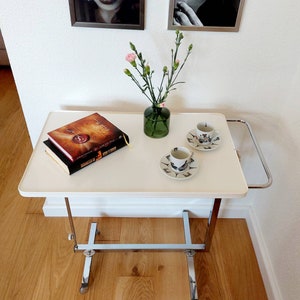 60s original Bremshey serving trolley / bar trolley made of chrome with white tray, height adjustable