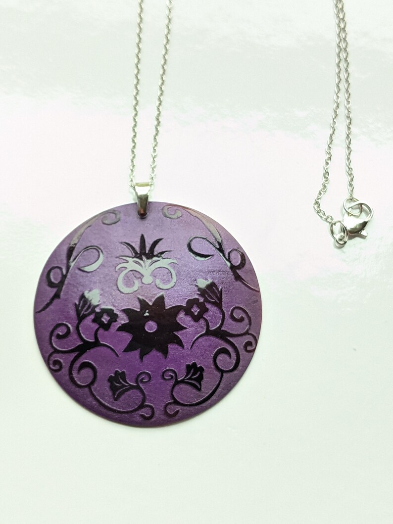 black pen shell purple flowers natural Focal