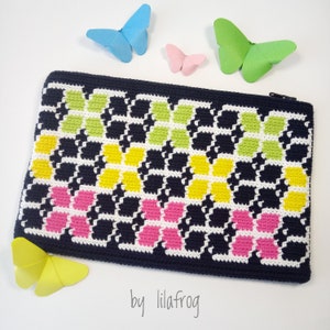 May include: A black crocheted zippered pouch with a geometric pattern of pink, yellow, and green butterflies. The pouch is on a white surface with paper butterflies.