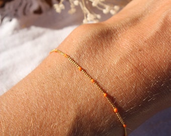 Bracelet chaîne en acier doré, émail orange