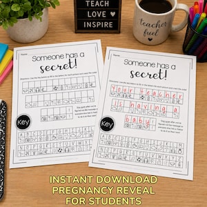 May include: Two white printable worksheets with the text "Someone has a secret!" and a coded message. One worksheet is filled in with the message "Your teacher is having a baby!" A mug with "teacher fuel" is visible.