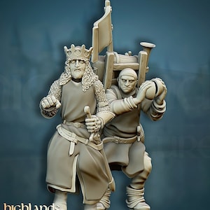 May include: A detailed miniature sculpture of two medieval figures. One figure is a king wearing a crown and chainmail, holding a sword. The other figure is a servant carrying a large object. The sculpture is in a neutral color.