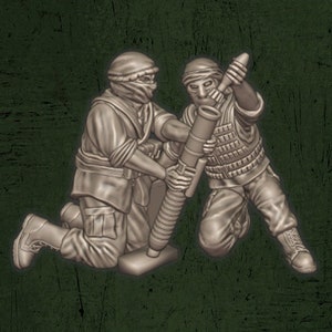 May include: A detailed 3D-printed miniature depicting two soldiers operating a mortar. The figures are dressed in military attire, with one kneeling and the other standing, both focused on the weapon. The Quartermaster 3D logo is in the bottom right corner.