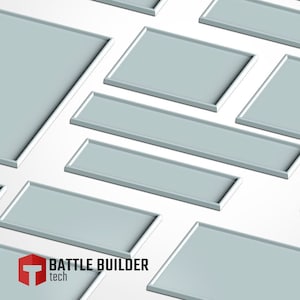 May include: A collection of light gray rectangular trays with white borders, arranged at various angles against a white background. The trays vary in size and shape. The logo "BATTLE BUILDER tech" is in the bottom left corner.