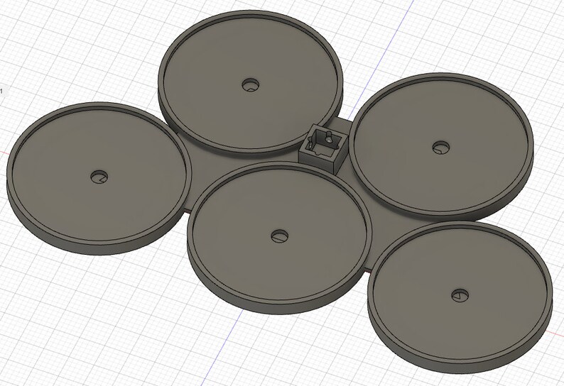 May include: A 3D-rendered, gray plastic component featuring five circular platforms with central holes, connected by a flat base. A small, rectangular structure is integrated into the design, possibly for additional functionality.