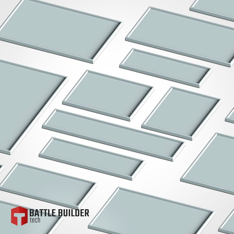 May include: A collection of light gray rectangular trays with white borders, arranged at various angles against a white background. The trays vary in size and shape. The logo "BATTLE BUILDER tech" is in the bottom left corner.