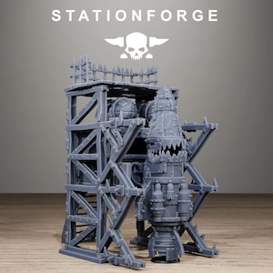 May include: A gray resin miniature model of a fortified tower structure featuring the text STATIONFORGE at the top. The tower includes a spiked fence, a large rocket-shaped projectile with a jagged mouth, and complex metal scaffolding supports.