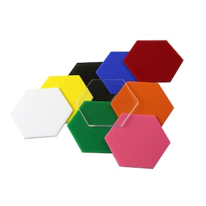 May include: Assortment of colorful hexagonal acrylic shapes in red, orange, yellow, green, blue, pink, white, and black. The shapes are arranged in a staggered pattern.