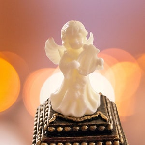 Set of two candles.  Girl with a harp.  Author&#39;s work.  Candle figurine.  Candle girl.  Angel candle.