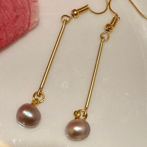 Fine quality glossy lavender South Pacific pearl dangle drop earrings, long slender shiny perfectly formed  pearl nugget earrings.
