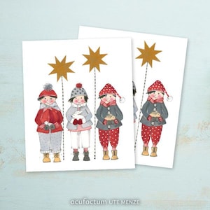 Könnte beinhalten: Drei Kinder in Winterkleidung stehen vor einem weißen Hintergrund. Sie halten kleine Geschenke und lächeln. Über ihnen befinden sich drei goldene Sterne. Der Text "acufractum UTE MENZE" befindet sich am unteren Rand des Bildes.