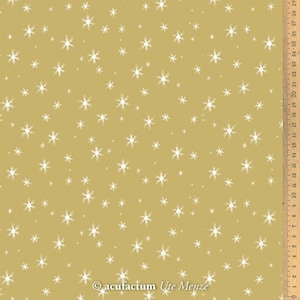 May include: A gold fabric with a white snowflake pattern. The fabric is printed with the text "acufactum Ute Menze".