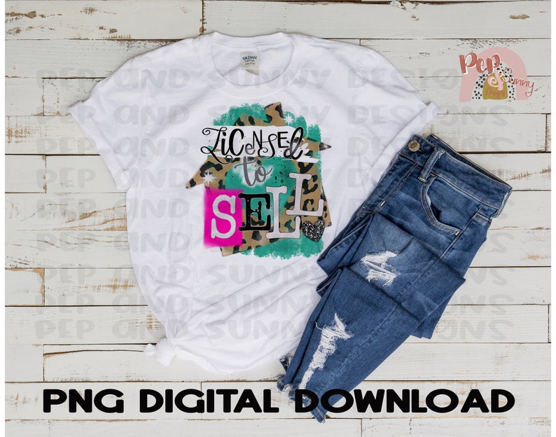 May include: A white t-shirt with a green, pink, and black graphic that says "Licensed to Sell". The graphic is a house shape with a leopard print pattern.