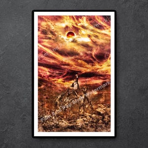 May include: A framed art print depicting a dramatic, fiery sky with a dark red sun. Figures are silhouetted against the backdrop, with one raising an arm. The print has a watermark that reads "Film And Pop Shop Watermark".