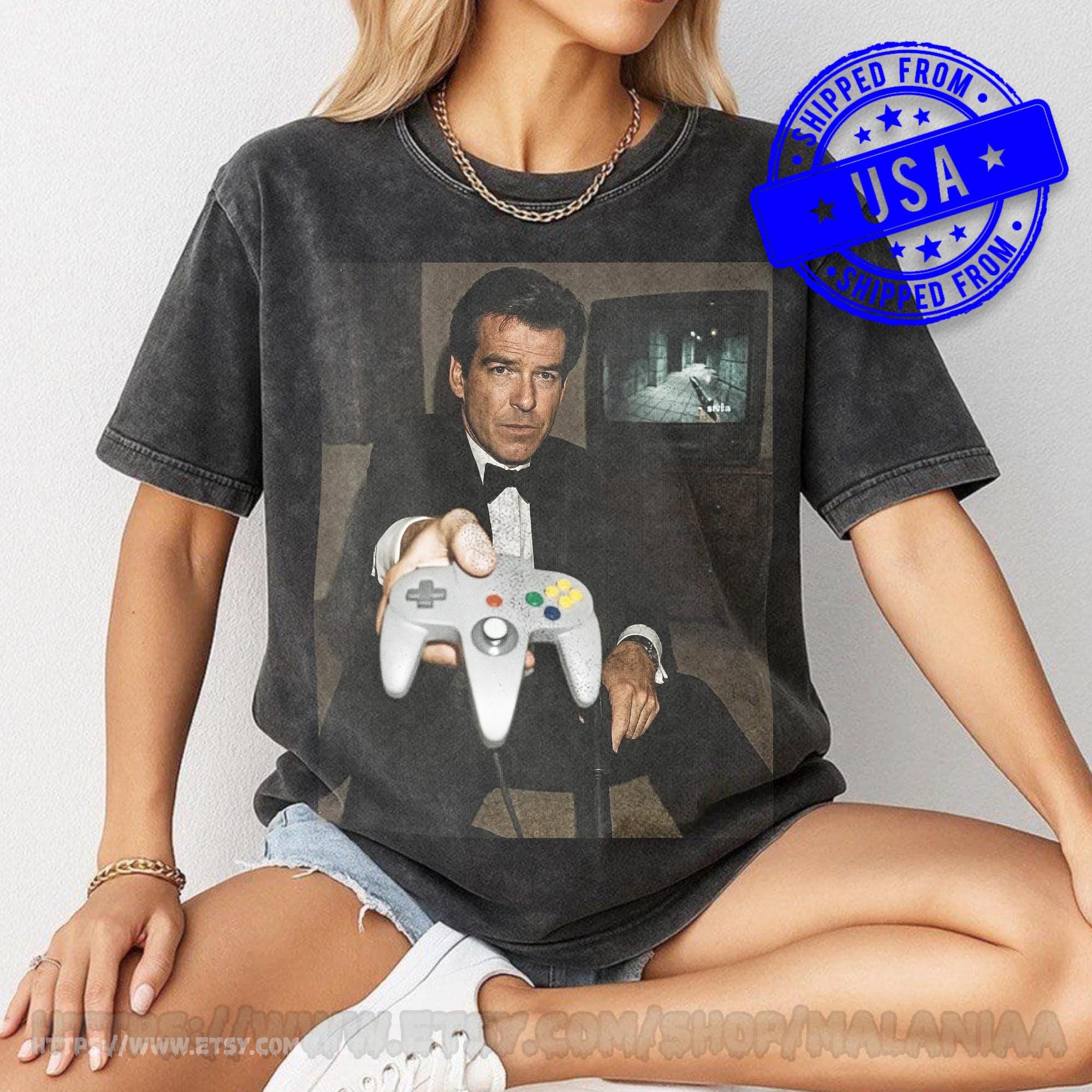 アイケーイーGRAPHICOVERSIZEROUNDT-SHIRT #007.5 Pierce Brosnan Goldeneye N64 Shirt - Vintage Style James Bond 007