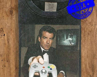 Camiseta GoldenEye de Pierce Brosnan para N64 - Camiseta estilo vintage de James Bond 007 - Camiseta retro de Nintendo 64 - Camiseta gráfica con colores cómodos