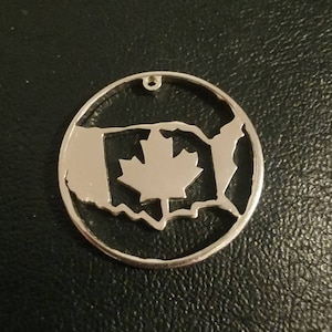 Custom hand cut coin pendants