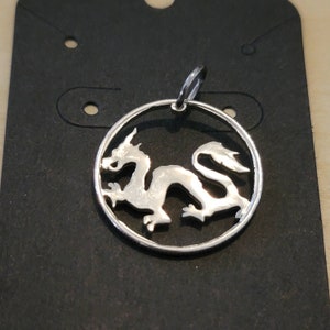 Silver quarter Asian styled Dragon hand cut coin Pendant necklace.