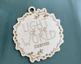 Light Of The World - John 8:12 Name of Christ from the Bible Christmas Ornament collection. Laser Engraved family business. The perfect gift
