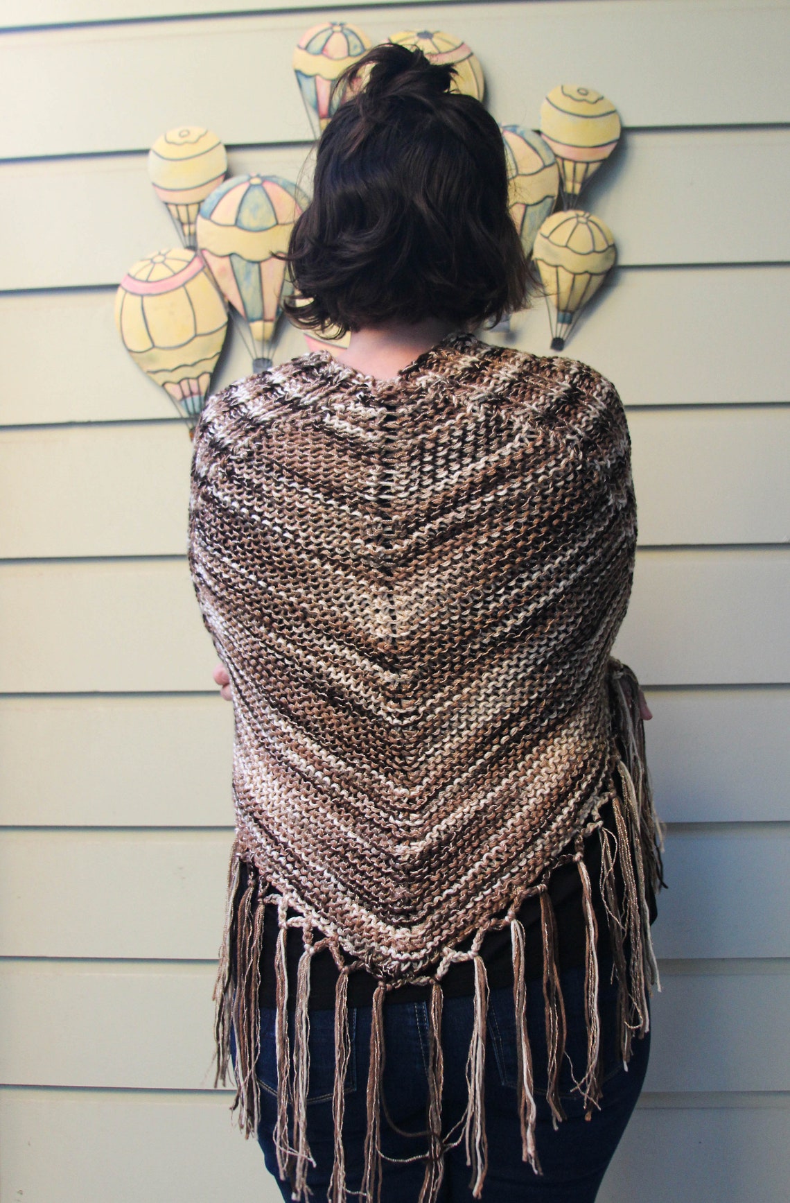 knitted shawl with sleeves