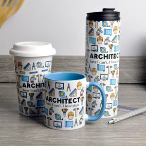 May include: A collection of architect-themed drinkware, including a travel mug, a coffee mug, and a to-go cup. Each item is white with a blue and yellow design of architectural tools and the text "ARCHITECT Sorry I can't, I have plans."