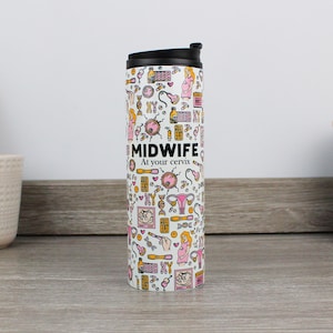 May include: White travel mug with a black lid and a pink and white design featuring a variety of medical illustrations and the text "MIDWIFE At your cervix".