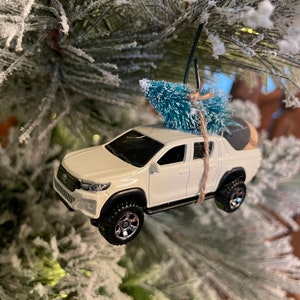 Toyota Hilux White Carrying Christmas Tree Christmas Ornament Hot Wheel Gift for dad / son