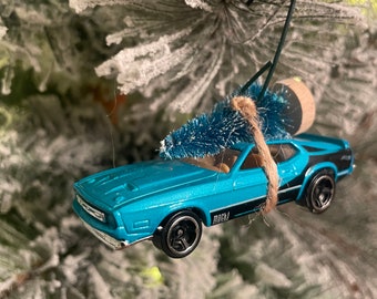 Ford Mustang Mach 1 1970’s Teal Convertable Carrying Christmas Tree Christmas Ornament Hot Wheel