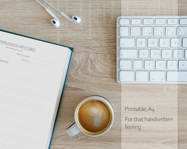 May include: A green and white journal with the words "PERVISION RECORD" on the cover. The journal is open to a blank page with lined paper. A cup of coffee, a keyboard, and a pair of white earbuds are also in the image. The text "Printable, A4" and "For that handwritten feeling" is also visible.