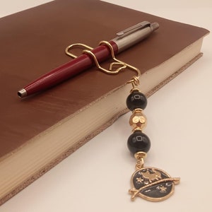 Portalápices con dije: clip dorado, accesorio para agenda