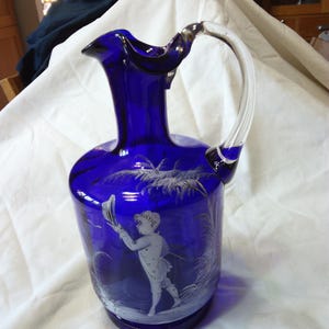 Stunning Mary Gregory Style Blue Glass Jug
