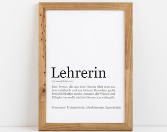 May include: A framed print with the word "Lehrerin" in bold black text. The definition of the word is in smaller black text below. The definition reads: "A person who teaches from the heart instead of the textbook and makes great personalities out of small people. Someone who passes on knowledge and skills to the next generation." The text "Synonyms: Matmacherin, Alleskannerin, Superheldin" is in smaller black text below the definition.
