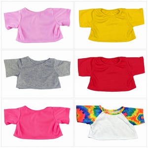 six different t-shirt designs, each with a unique color and style, arranged in a grid format.