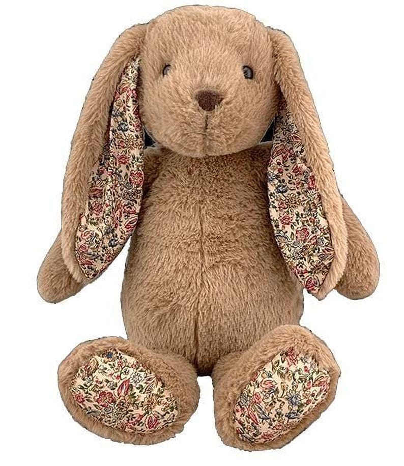A brown stuffed bunny toy with floral patterns on its ears and feet.
