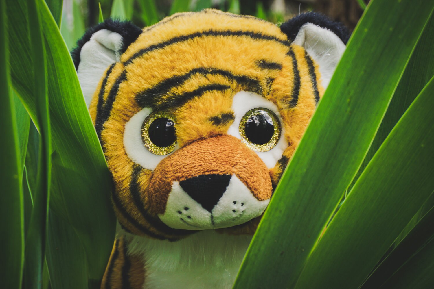 green stuffed tiger