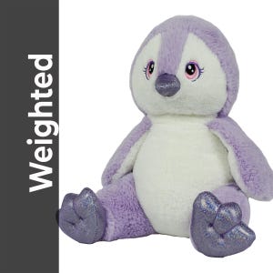 May include: A plush penguin toy in shades of lavender, white, and silver. The penguin has a soft, fluffy body, with a white belly and lavender head, wings, and feet. The text "Weighted" is on the left side of the image.