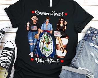 May include: Black t-shirt with a graphic of three women, one holding a coffee cup, one holding a phone, and one holding a laptop. The graphic also includes the text "American Raised Belize Blood" and the flag of Belize.