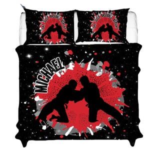 May include: A black bedding set featuring two pillowcases and a comforter with a red and grey paint splatter design. The print shows silhouettes of two people grappling in a martial arts stance, the name MICHAEL, and the text EAT, SLEEP, BASEBALL, REPEAT.