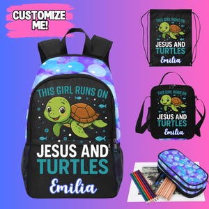May include: A black backpack, drawstring bag, and lunch bag featuring a cartoon turtle and the text "THIS GIRL RUNS ON JESUS AND TURTLES Emilia". The backpack has a purple and blue pattern.