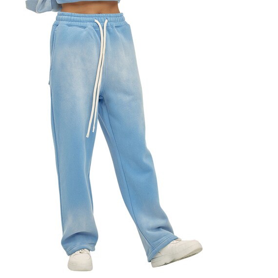 Distressed track deals pants