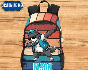 Mochila con diseño de gato bailando para niños, con nombre impreso, para la vuelta al cole.