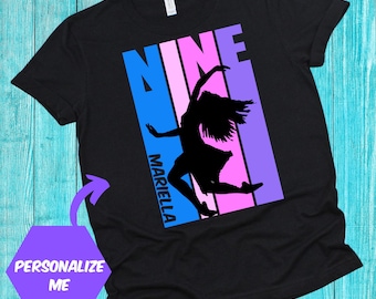 May include: Black t-shirt with a silhouette of a dancer in front of a colorful "NINE" graphic. The name "MARIELLA" is written vertically on the left side of the graphic.