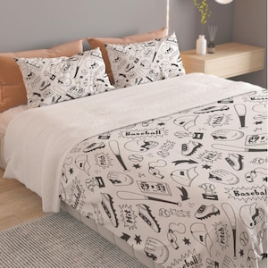 May include: A white bedding set featuring a black line-art pattern of baseball equipment including bats, gloves, helmets, cleats, and balls, interspersed with comic-style speech bubbles containing the words Baseball, Pitch, and Hit.