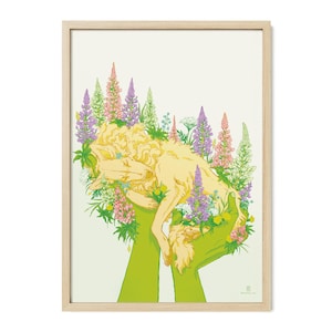 May include: A framed art print featuring a stylized illustration of a yellow dog resting in a bed of colorful flowers. The dog is cradled in green hands, with a light green background. The flowers include purple, pink, and white blooms.