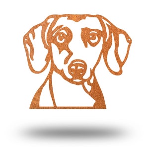 May include: A rusty brown metal cutout of a dachshund dog's head. The dog is looking directly at the viewer with its ears perked up.