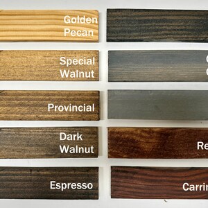 May include: A wood stain color chart with ten different wood stain colors. The colors are: Golden Pecan, Special Walnut, Provincial, Dark Walnut, Espresso, Ebony, Carbon Grey, Grey, Red Oak, and Carrington.