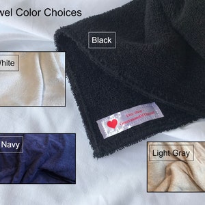 May include: Close-up of different colored towel swatches. The swatches are white, black, navy, and light gray. The text "Etsy shop - GenerationsOfThread" is visible on the black swatch.