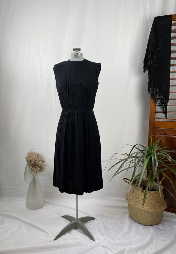 Black pleated crepe dress size 7, 1960s 1970s.