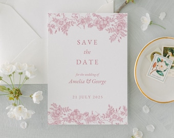 Puede incluir: Tarjeta de guardar la fecha con borde floral rosa. El texto dice "Save the Date" para la boda de Amelia y George, 21 de julio de 2025.